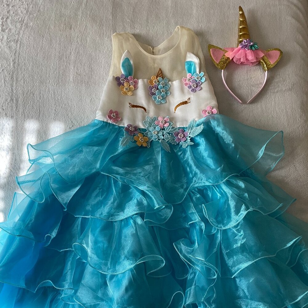 Kids fluffy Unicorn party dress with headband accessory.
